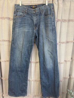 Lucky Brand 181 Relaxed Straight Men’s 33x32 Distressed Hem Medium Wash Jeans